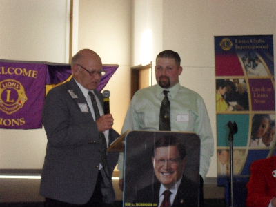 Jim Appelget Presents Colfax-Mingo President Joe Steenhoek With a  Gavel