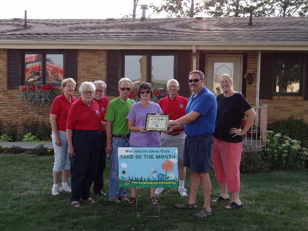 Front L to Rt: Club Pres. Maggie Stout, Mark McCoun, Cindy McCoun, Mayor Bill Roberts. Back L to Rt:  Lions Mary Halstead, Ned Stout, Jim Appleget, Kris May.